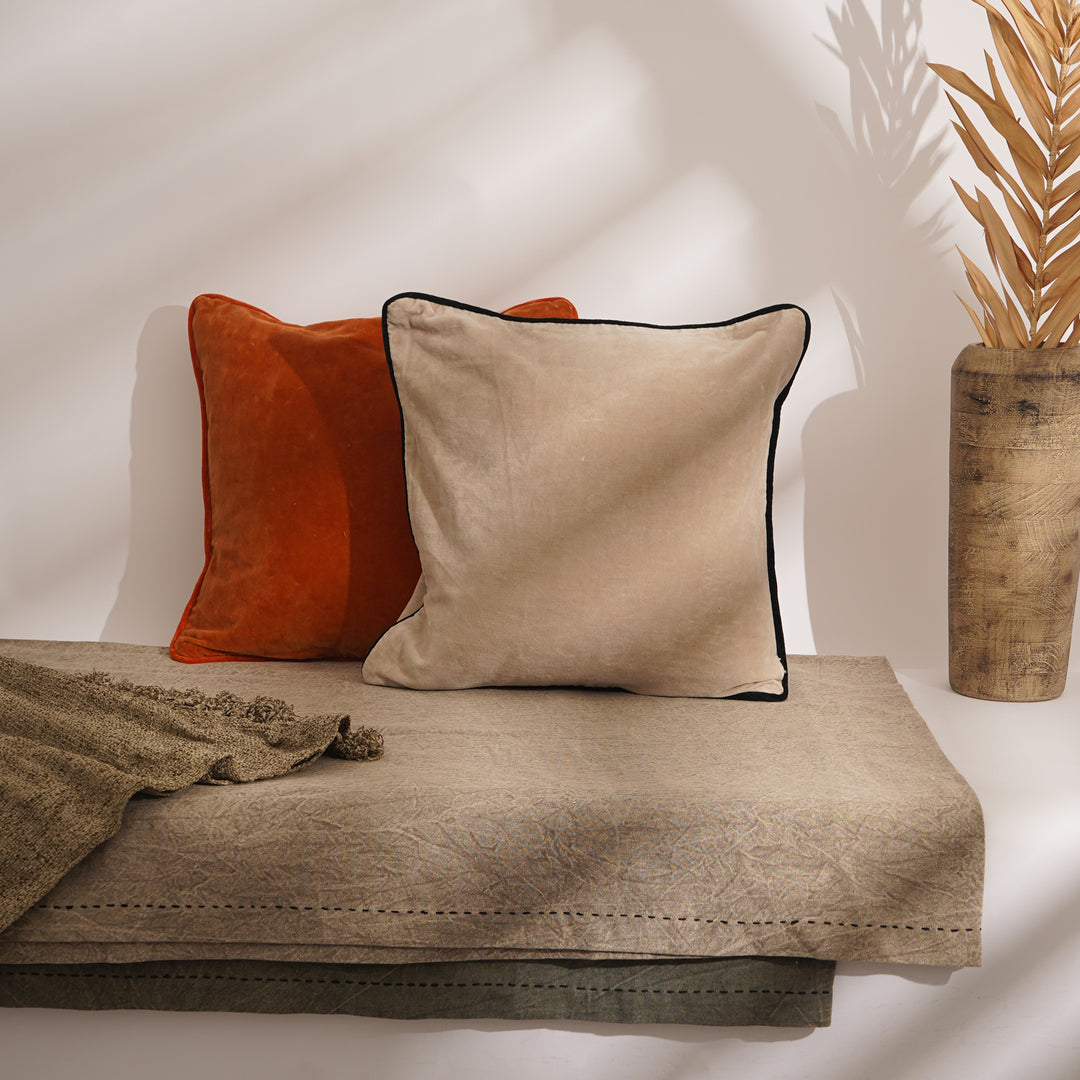 COUSSIN UNI EN VELOURS DE COTON AVEC PIPING - 45X45 CM - Ivoire